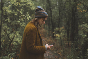 https://thetroutshop.com/cdn/shop/files/woman-texts-during-autumn-hike_300x.jpg?v=1613697448